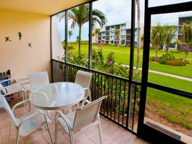 Screened porch with table set